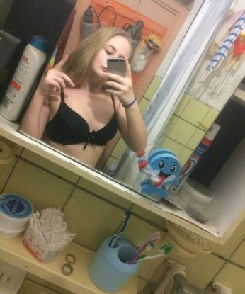 Оля